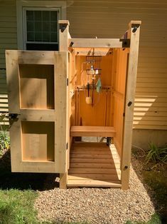 an outhouse built into the side of a house