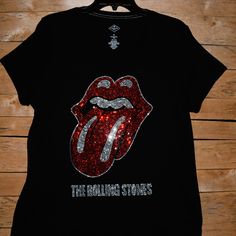 At This Time, I Am Not Accepting Offers For Any Of My Rolling Stones Shirts As I Have Very Limited Supplies. Custom Made To Order Rolling Stones Rhinestone Bling Shirt Black Short Sleeved Vneck Shirt Available As A Round Neck In My Other Listing. This Shirt Features A Large Stones Design With 1000's Of Sparkling Very Colorful Rhinestones. Great Concert Shirt Or Just A Great Way To Celebrate The Amazing Rolling Stones. Shirts Used Are First Quality Retail Shirts That Run True To Size. They Do Not Fitted V-neck Top With Rhinestones, Casual Sequined V-neck Top, Casual V-neck Sequined Tops, Black V-neck Tops With Rhinestones, Black V-neck Top With Rhinestones, Rolling Stones Shirt, Bling Shirt, Rhinestone Shirt, Rhinestone Projects