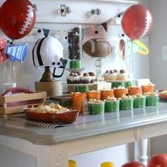 a football themed party with cupcakes and snacks