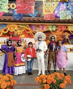 a group of people dressed up in costumes