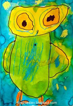 an art project for kids that uses watercolors and ink to create an owl