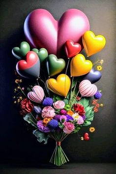 a bunch of heart shaped balloons are in a vase filled with flowers and greenery