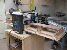 a table sawing machine in a garage