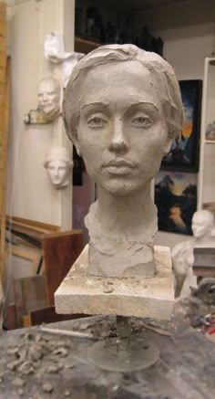 a sculpture of a woman's head is on display