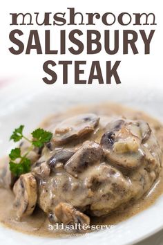 mushroom salisbury steak with gravy on a white plate