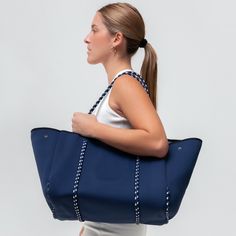 The cool, everyday bag that’s perfect for work, gym, beach, traveling, and everything in between. Functional Blue Shoulder Bag For Travel, Large Capacity Tote Gym Bag For Weekend, Sporty Rectangular Weekend Travel Bag, Blue Tote Bag For Weekend, Casual Blue Tote Travel Bag, Blue Weekender Bag With Large Capacity, Blue Weekender Bag With Double Handle For Travel, Sporty Tote Gym Bag For Weekend, Blue Double Handle Weekender Bag