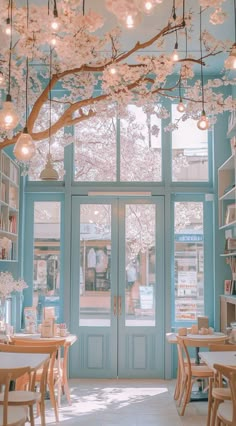 the inside of a restaurant with tables and chairs