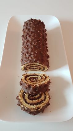 there is a chocolate roll on the plate