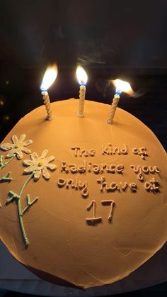 a birthday cake with lit candles that says, the kind of someone you love is only 1 / 4