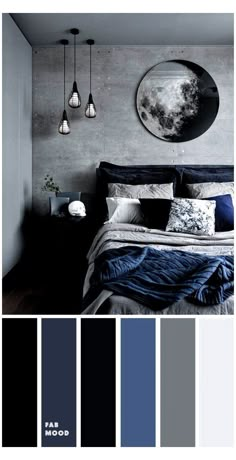 a bedroom with grey walls and blue bedding