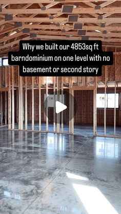 an empty room with wooden framing on the walls and floor is shown in this video