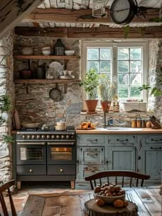 an old fashioned kitchen with stone walls and flooring, wooden table and chairs in front of the stove