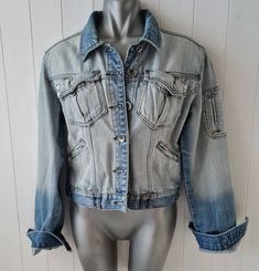 Vintage distressed denim jacket by Crafted Size UK14 Chest 19" (38" chest) Nape to hem 19" Underarm to cuff19" Model size UK10/12 Cool weathered faded, bleached, dip dyed effect Zipped small front pockets, lots of detail, rivets etc and distressing Y2k Denim Jacket With Pockets, Light Wash Recycled Denim Jacket For Streetwear, 90s Style Washed Denim Jacket For Spring, Fitted Medium Wash Recycled Denim Jacket, Recycled Denim Light Wash Long Sleeve Jacket, 90s Washed Long Sleeve Denim Jacket, Fitted Washed Denim Jacket For Streetwear, Fitted Washed Denim Jacket, 90s Style Light Wash Denim Jacket