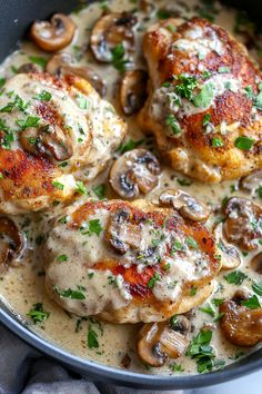 chicken with mushrooms and gravy in a skillet