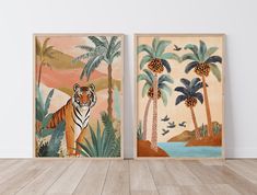 two paintings of tiger and palm trees are on display in an empty room with wood flooring