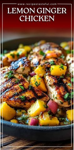 lemon ginger chicken in a skillet on a wooden table with text overlay that reads, lemon ginger chicken