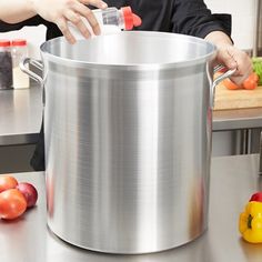 Perfect for preparing stocks, soups, and liquids, this 60 qt. Vollrath Wear-Ever Classic Select 68660 aluminum stock pot's tall and narrow shape allows liquids to bubble up through the food for superior flavor infusion!    Constructed of heavy gauge, impact-resistant 3004 aluminum with spot-welded handles for sturdiness, this stock pot is durably designed specifically for commercial kitchen use and ensures safe operation for your kitchen employees. Its smooth surface also allows for quick and ea Heirloom Kitchen, Stock Pots, Bubble Up, Sauce Pot, Steamed Vegetables, Hotel Supplies, Creamy Mashed Potatoes, Pot Designs, Stock Pot