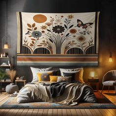 a large tapestry hanging over a bed in a room with wooden floors and furniture on the wall