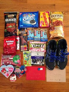 various snacks and shoes on a wooden floor