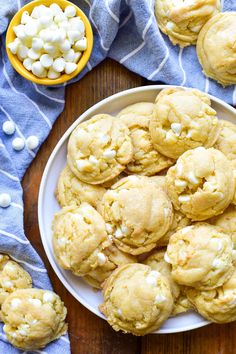 a white plate filled with cookies and marshmallows