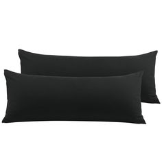 two black pillows sitting next to each other