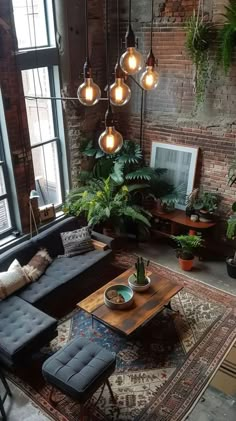 a living room filled with furniture and lots of plants