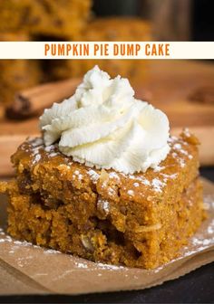 pumpkin pie dump cake with whipped cream on top