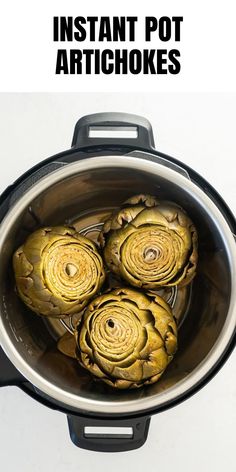 artichokes in an instant pot with text overlay that reads instant pot artichokes