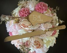 a bridal bouquet with pink and white flowers