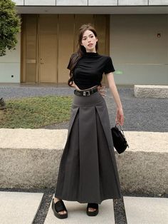 Features: Stylish and trendy long skirt, exuding a fashion-forward look 👚🌟 Made with high-quality fabric for ultimate comfort and breathability 😍🌸 Beautiful gray color, adding a touch of elegance to any outfit 🌈👌 Flattering and flowy silhouette, perfect for any body type 💃🌟 Designed with Korean fashion sensibilities, paying attention to intricate details 🎀🌼 Versatile Styling Options: Ideal for both casual outings and formal occasions 🎉🌸 Pair it with a chic blouse or crop top for a sophisticated ensemble 👚🔥 Dress it down with a casual t-shirt or sweater for a relaxed yet stylish look 👕🌟 Korean Skirt Outfits Long, Outfits With Flowy Skirt, Japanese Long Skirt Outfit, Long Gray Skirt Outfit, Long Skirt And Shirt, Grey Maxi Skirt Outfit, Flowy Tops Outfit, Long Skirt With Shirt, Shirt And Long Skirt