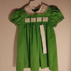 Green With White Collar. Ribbons Interchange . Pumpkins On 1 Trees On 1. New With Tags. Cute Green Dresses For Playtime, Cute Green Dress For Playtime, Cute Green Dresses For Casual Wear, Green Short Sleeve Dress For Formal Occasions, Green Cotton Dress For Babies, Green Cotton Dress For Dress-up, Green Short Sleeve Dress For Holiday, Cute Green Dresses For Holiday, Green Cotton Holiday Dress