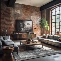 a living room filled with furniture and a flat screen tv mounted to the wall next to a window