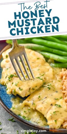 the best honey mustard chicken with green beans and rice on a blue plate, with a fork