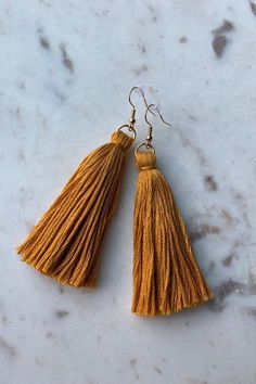 Excited to share this item from my #etsy shop: Mustard Tassel Earrings, Tassel Earrings, Long Tassel Earrings, Short Tassel Earrings, Trendy Earrings, Stylish Earrings, Boho #tassels #tasselearrings #mustardcolortassels #fall #outfit #winter #falloutfit #jewellry #birthdaygifts #goldearrings #silverearrings #bohostyle #howtomake #diy #dangleearrings #fringeearrings #jewelry #thanksgiving #bohohippie #yellowtassels #winteroutfit #trendyearrings #cambrenboutique Tassel Earrings Outfit, Diy Tassel Earrings, Tassels Tutorials, Earrings Outfit, Crystal Bridal Earrings, Brick Stitch Earrings