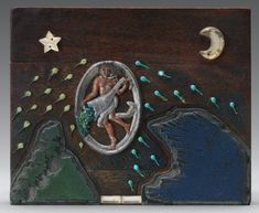 a wooden box with an image of a man in the water and stars on it