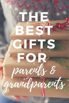 the best gifts for parents and grandparents are wrapped in brown paper with red berries on them