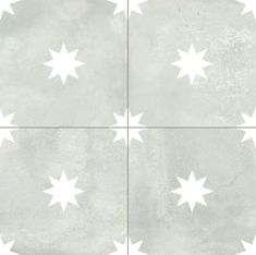 four square tiles with white stars on the top and bottom, all in different sizes