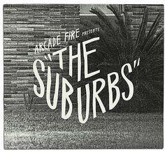 a black and white photo with the words'on the suburbs'in front of a brick wall