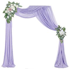 an image of a wedding arch decorated with flowers and greenery on it's side