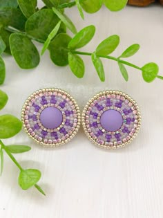 "Purple circle earrings. Beadwork earrings with rhinestone. Beaded earrings with cabochon. Earrings are handmade from Japanese beads Toho, using felt, a strong synthetic thread, nickel-free clasp, rhinestone chain, and leatherette. Measurements: Diameter earrings ≈ 1,25\" You can see more colors here: https://www.etsy.com/listing/1291802643/beadwork-stud-native-style-earrings It will be a great gift, I send all jewelry in gift wrapping. Please note: do not wear beaded jewelry during active sports, swimming, and sunbathing. Do not put perfume and other cosmetics on bead jewelry. Real colors may slightly differ from one on the monitor to another, as it depends on specific monitor settings. You can also order earrings in colors you like! Thank You for visiting my store! Please, don't hesitate Purple Circle, Embroidery Earrings, Native American Beadwork Patterns, Beautiful Beaded Earring, Beadwork Earrings, Native Beading Patterns, Beaded Earrings Native, Circle Jewelry, Art Perle