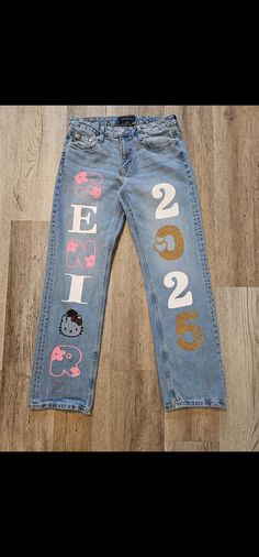 Senior Jeans made to order Any design can be done Please send an inspo pic and we will recreate it for you Follow us on Instagram @ caroboutiquegoods White Senior Pants, Senior Spirit Jeans, Senior Pants Ideas, Homecoming Pants, Senior Painted Jeans, Senior Pants, Senior Year Things, Senior Jeans, Senior Stuff