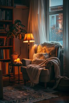 a living room filled with furniture and a lamp next to a book shelf full of books