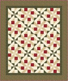 a quilt with red and green squares on it