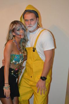 a man and woman dressed up in costumes