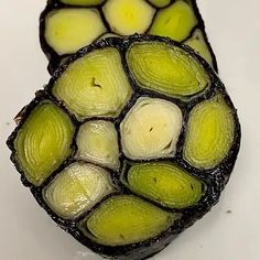 a close up view of the inside of a flower bud on a white table top