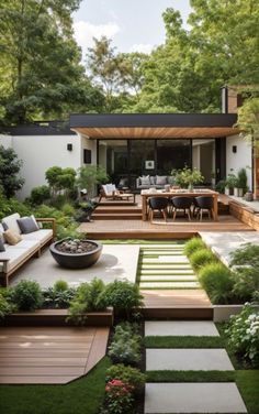 an outdoor living area with seating and landscaping