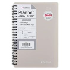 a spiral bound planner is shown on a white background