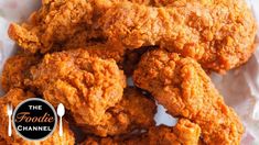 fried chicken is piled on top of each other