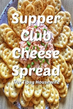 a plate with crackers and dip on it that says supper club cheese spread the tipsy housewife