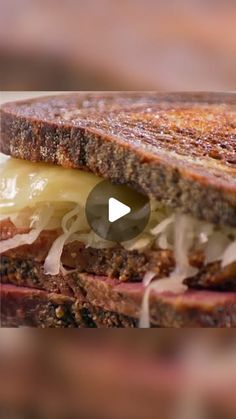 a grilled sandwich with cheese and meat is shown in this video screen graber